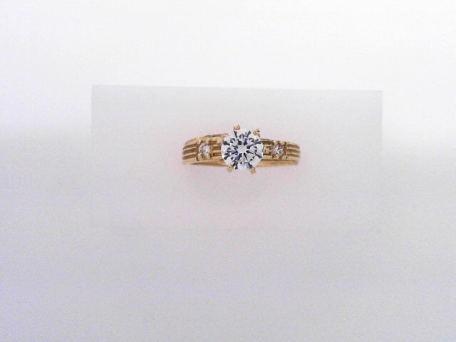 14 KARAT RING SIZE 7 WEIGHT: 3.1G
CZ SOLITAIRE RO