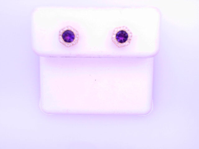 14 KARAT STUD EARRINGS WEIGHT: 1.4G : D 0.10CT AMA