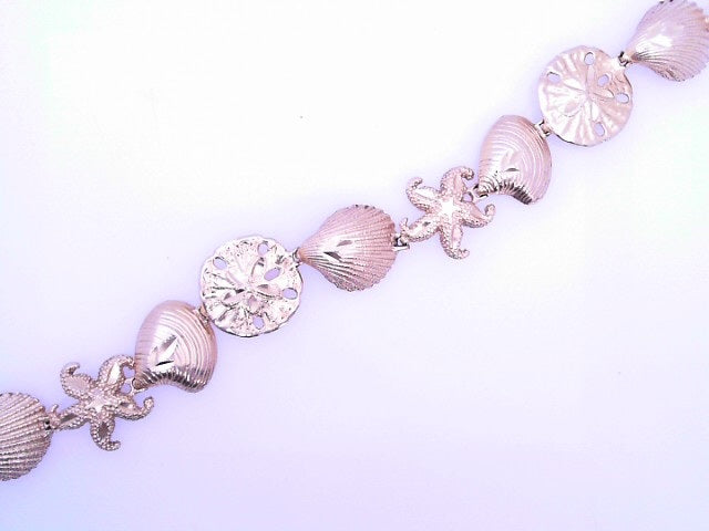 14 KARAT CUBAN MIAMI BRACELET LENGTH 7 WEIGHT: 63.