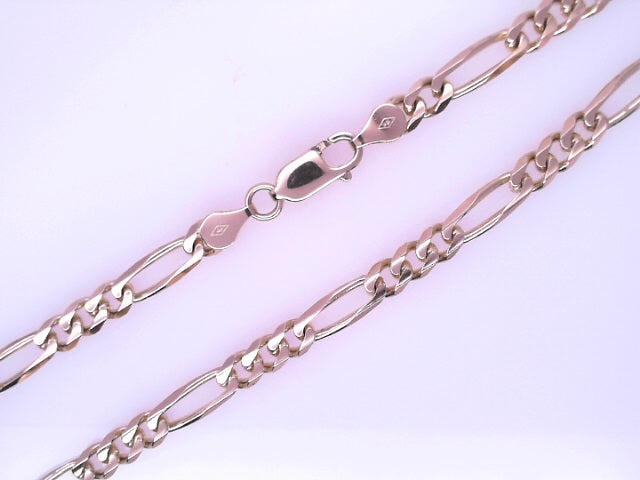 14 KARAT DIAMOND CUT FIGARO CHAIN LENGTH: 20
WEIG