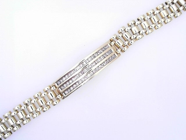 14 KARAT BRACELET WEIGHT: 31.9 R: NATURAL DIAMOND