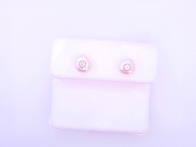 18 KARAT STUD EARRINGS WEIGHT: 0.5G : PINWHEEL TWO