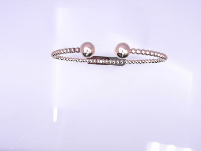 14 KARAT BANGLE BRACELET WEIGHT: 7.5G
BEAD BALL E