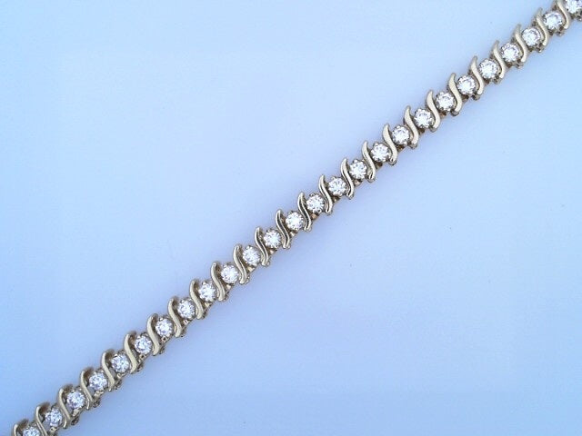 14 KARAT BRACELET LENGTH 7 WEIGHT: 13.8G : 5.7MM