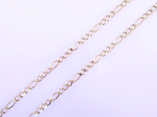 14 KARAT FIGARO CHAIN LENGTH: 23 WEIGHT: 5.3 : 2.5