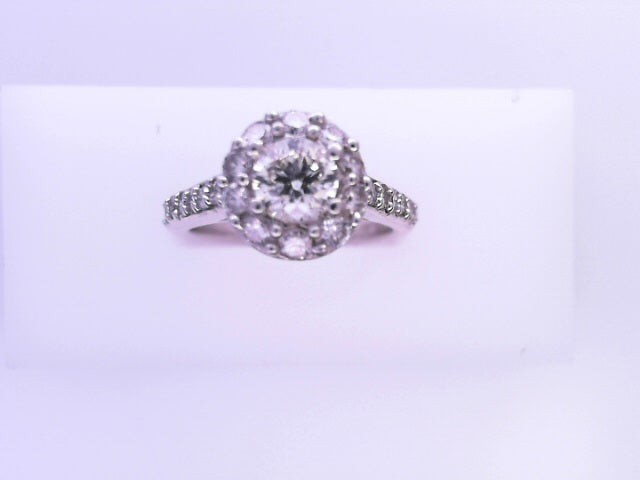 14 KARAT RING SIZE 7 WEIGHT: 4.7G : NATURAL DIAMON