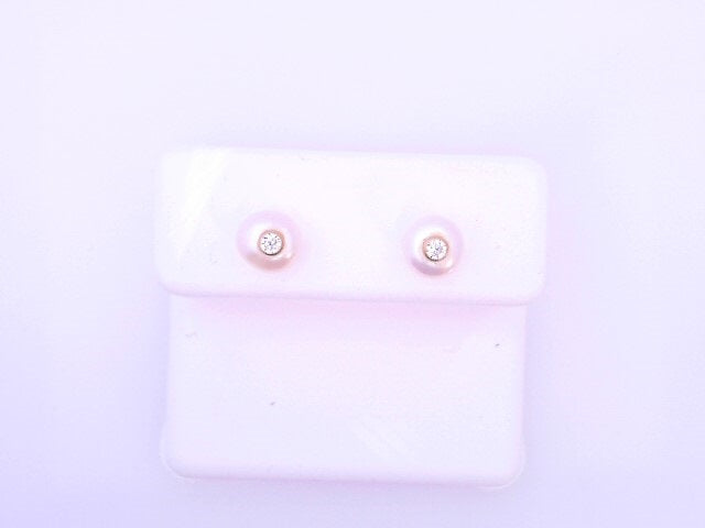 18 KARAT STUD EARRINGS WEIGHT: 0.5G : PINWHEEL TWO