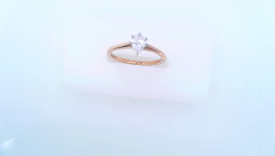 14 KARAT RING SIZE 6 WEIGHT: 2.3G
.18 CTW PEAR SO