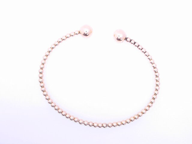 14 KARAT BANGLE BRACELET WEIGHT: 7.5G
BEAD BALL E