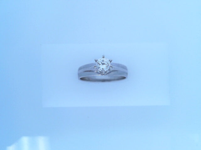 14 KARAT SATIN RING SIZE 7.5 WEIGHT: 3.2G
CZ WHIT