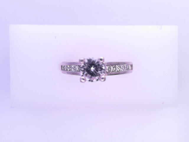14 KARAT RING SIZE 6.25 WEIGHT: 4.8G : NATURAL DIA