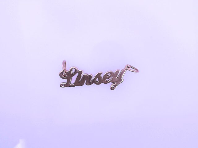 NAME PLATE 14 KARAT WEIGHT: 1.9G
STYLE LINSEY