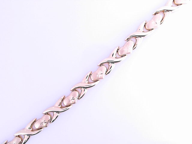 14 KARAT DIAMOND CUT CHARM WEIGHT: 0.9G
CROSS DC