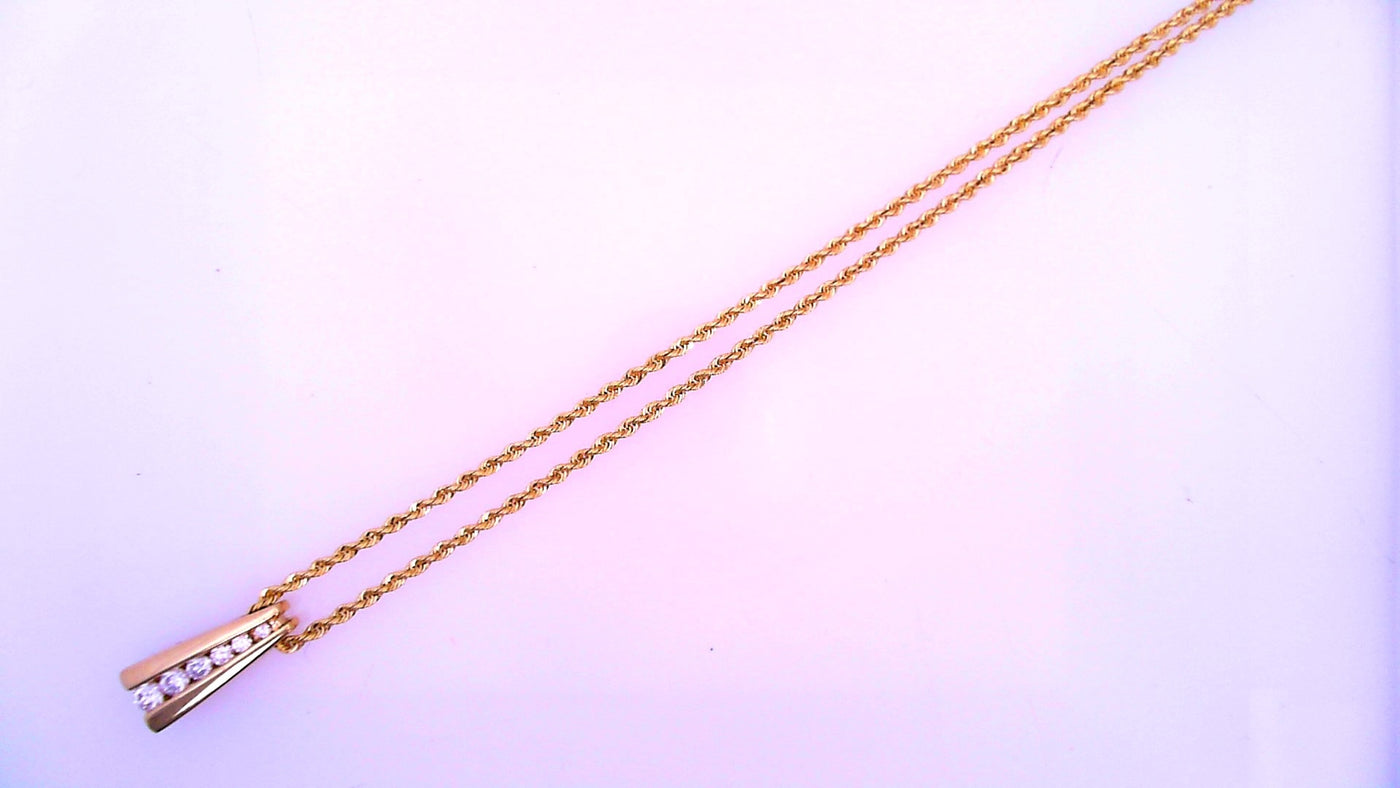 14 KARAT PENDANT WEIGHT: 6.3 : NATURAL DIAMOND 0.2