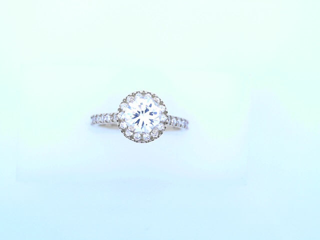 14 KARAT RING SIZE 7 WEIGHT: 2.5G
CZ HALO ROUND C