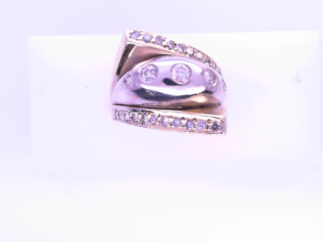 14 KARAT RING SIZE 6.5 WEIGHT: 8.0G : NATURAL DIAM