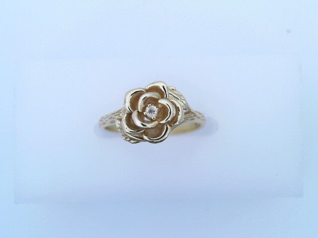 14 KARAT RING SIZE 5.75 WEIGHT: 2.2G : CZ FLOWER