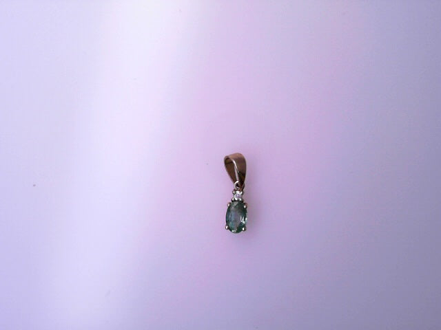 14K FREE FORM PENDANT NATURAL EMERALD OVAL