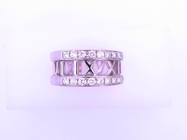 18 KARAT RING SIZE 7 WEIGHT: 6.6 : NATURAL DIAMOND